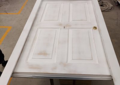 security door with arche and panels prepared for paiting