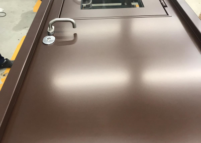 security door with flat steel panels and opening window